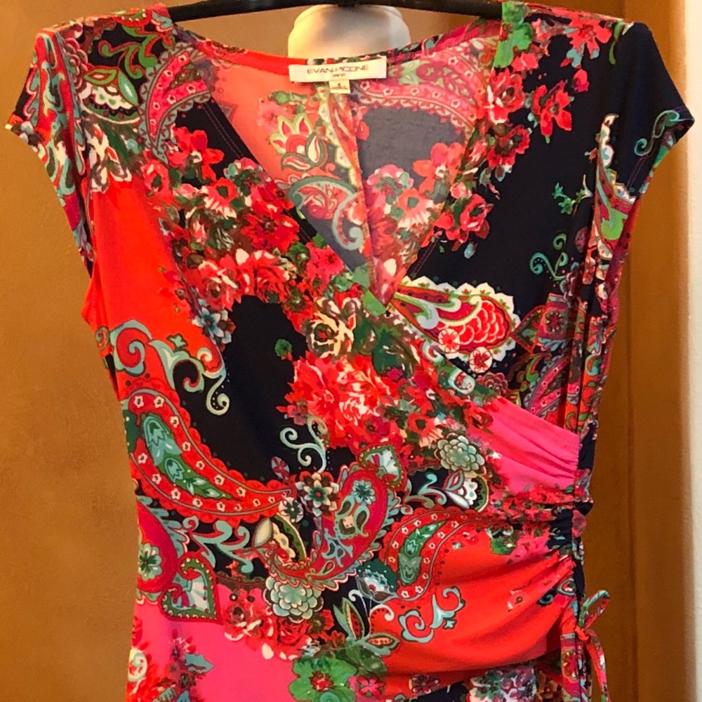 Multi colored knee length dress.